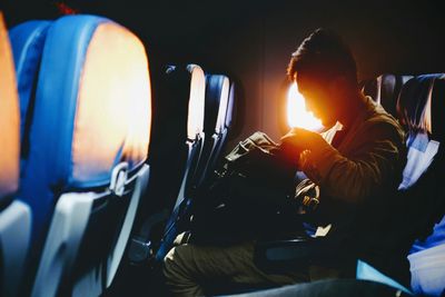 man sitting on an airplane