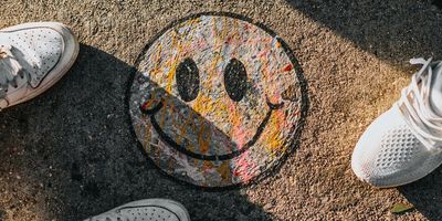 smiley face drawn in chalk