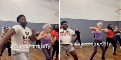 people dancing in a fitness studio