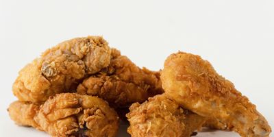 pieces of fried chicken on a white background