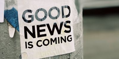 sign that says "good news is coming"