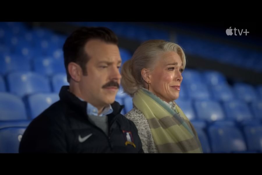 Ted and Rebecca sitting in the stands in the final episode of Ted Lasso