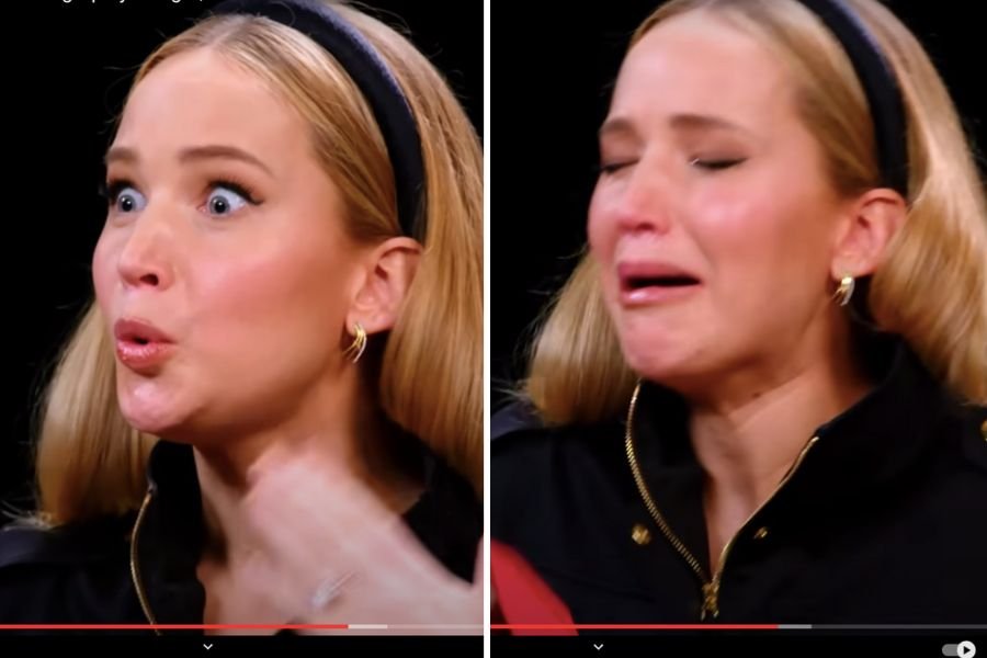 Jennifer Lawrence making faces from the spicy wings
