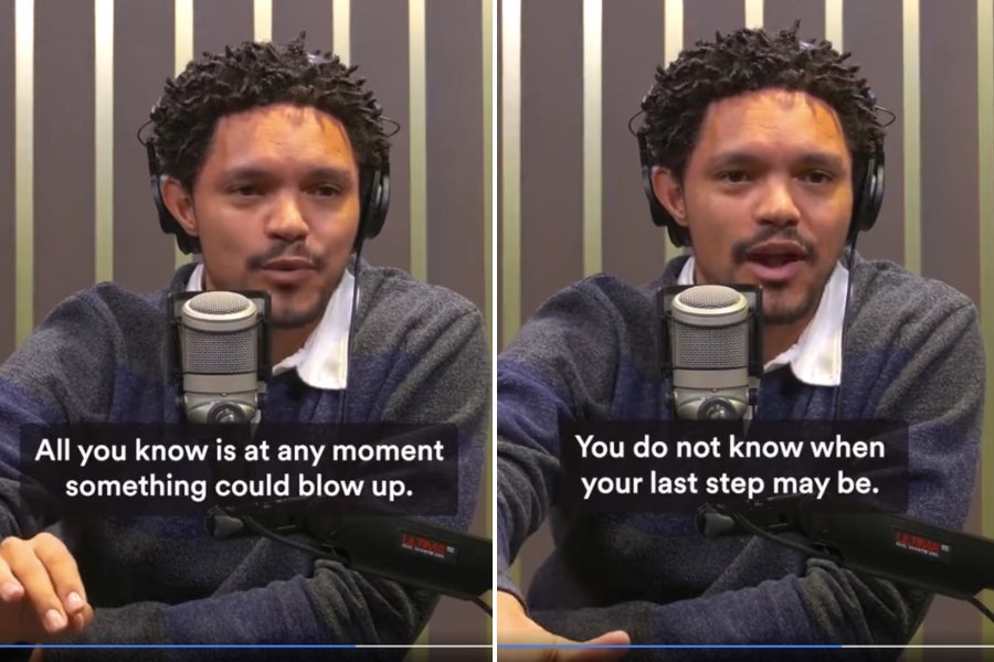 Trevor Noah speaking into a microphone