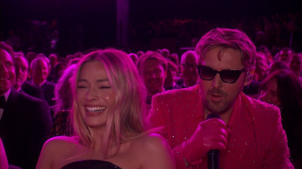 Ryan Gosling singing "I'm Just Ken" while Margot Robbie laughs