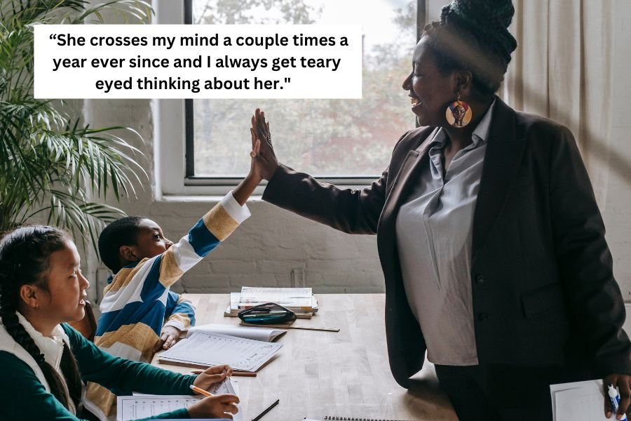 teacher high-fiving a student