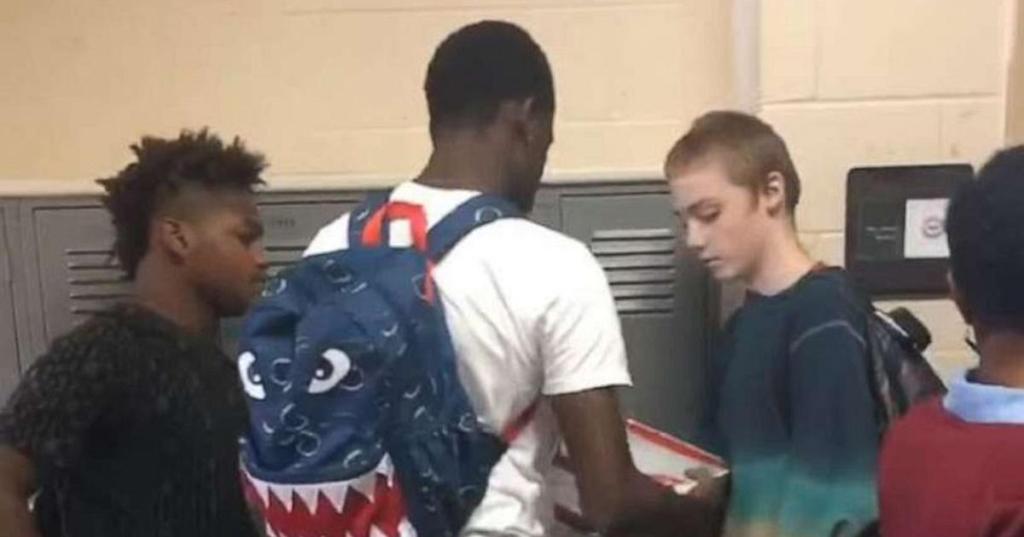 high schoolers in hallway