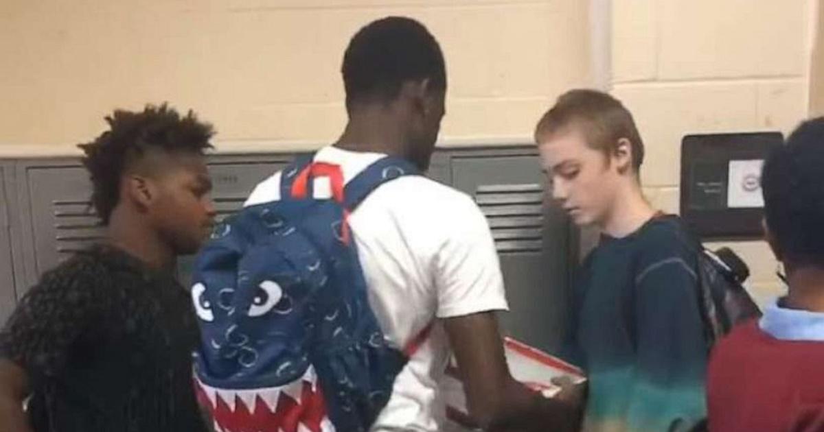 high schoolers in hallway