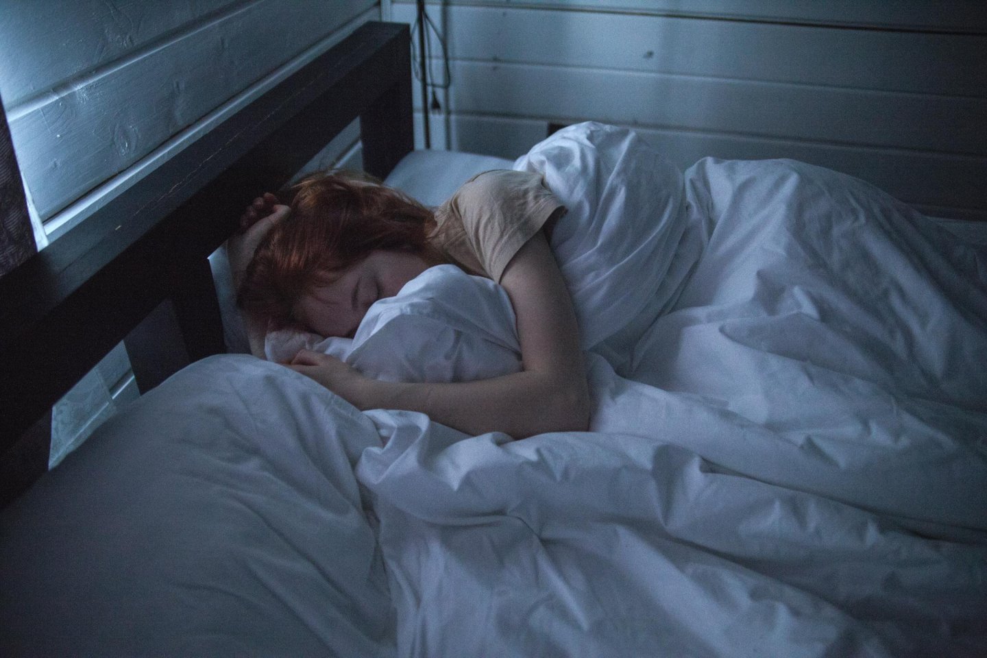 woman sleeping in a bed