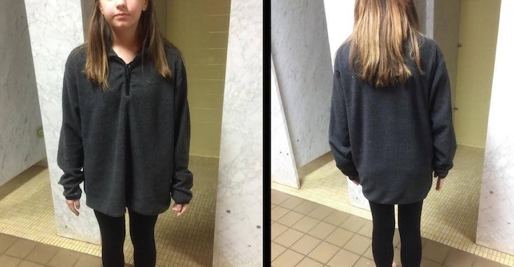 A girl at school wearing loose fitting shirt and black leggings