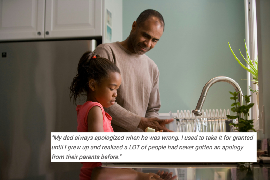 dad and daughter washing hands at kitchen sink