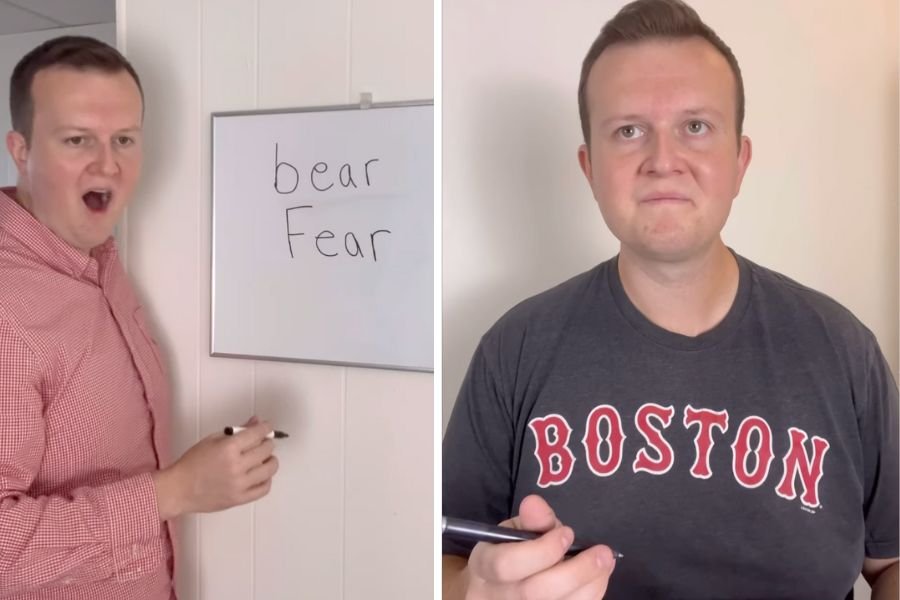 Comedian Bobby Finn with "bear" and "fear" written on a whiteboard