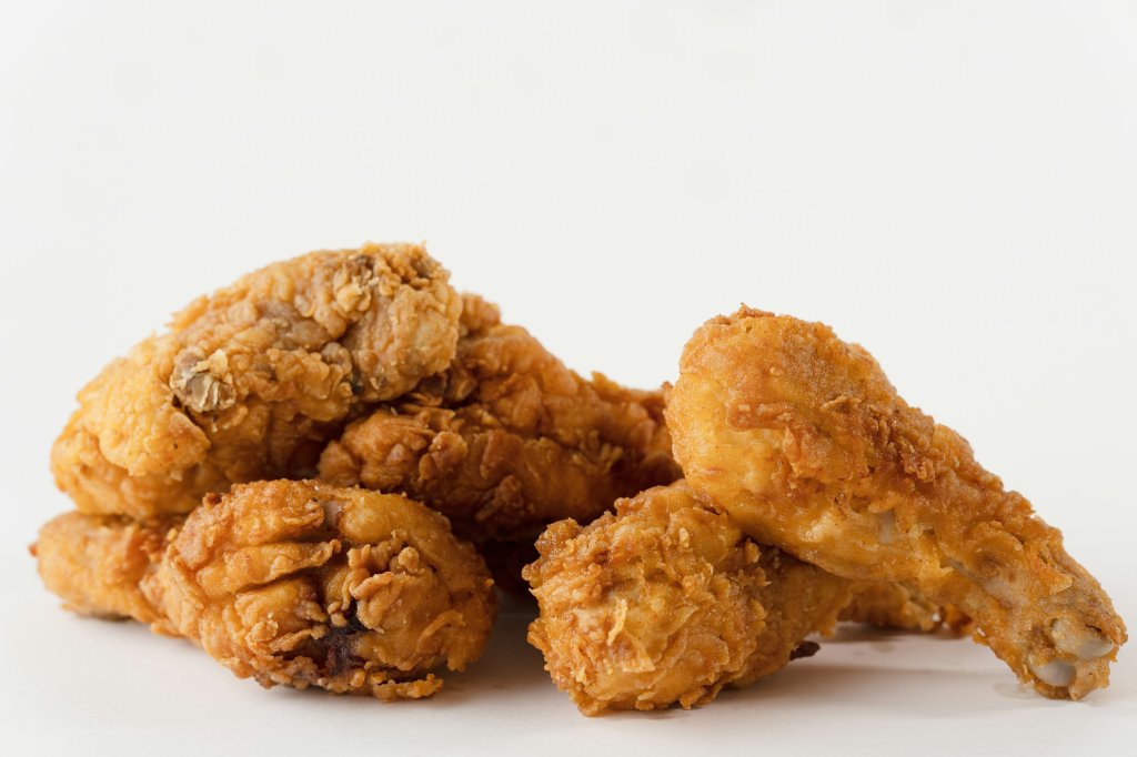 pieces of fried chicken on a white background