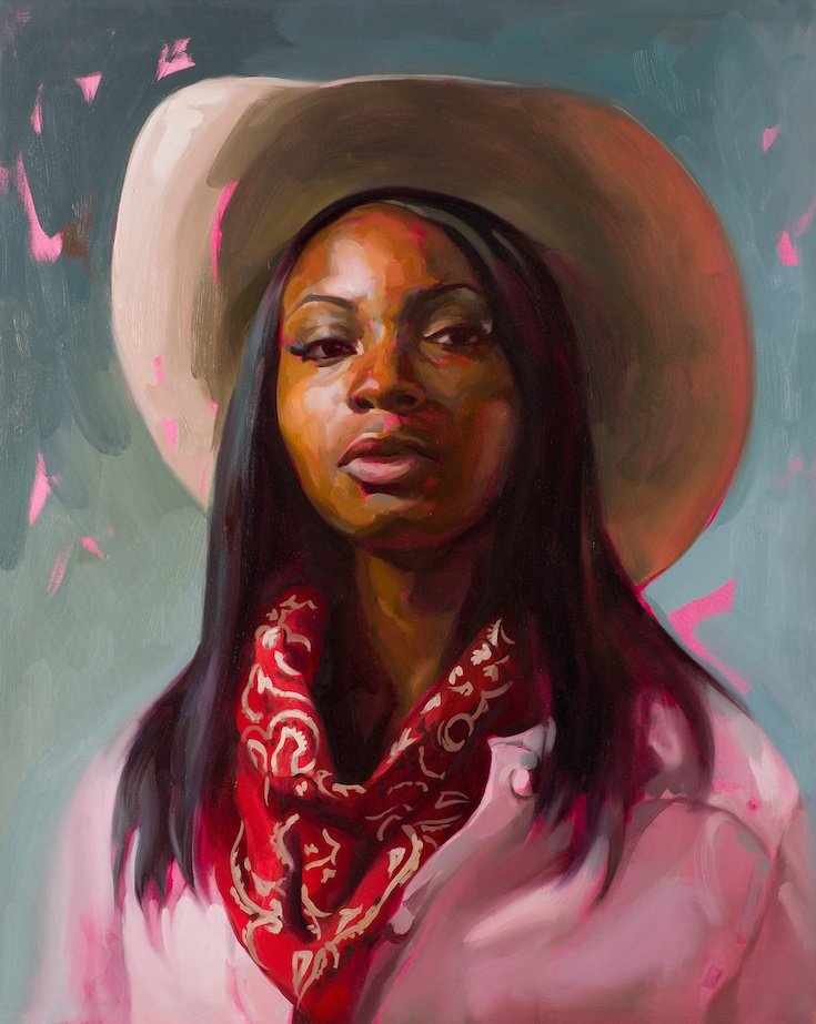 Woman in cowboy gear with pink shirt and red bandana