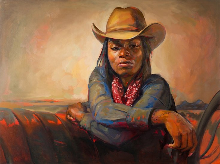 Woman in cowboy hat and red bandana