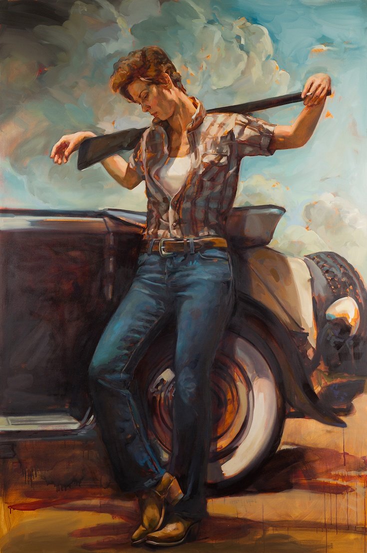 Woman in old fashioned Western clothing with rifle