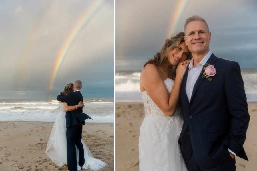 bride and groom in front of rainbow