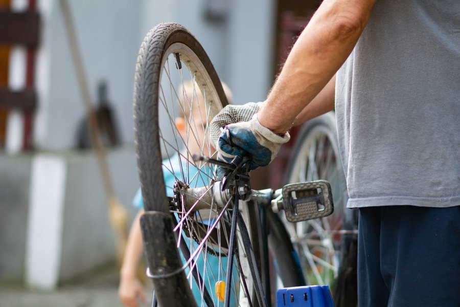 bike mechanic fixing a bike