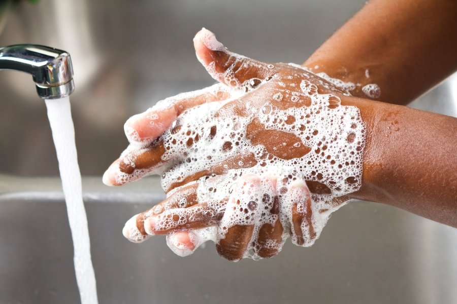 someone washing their hands