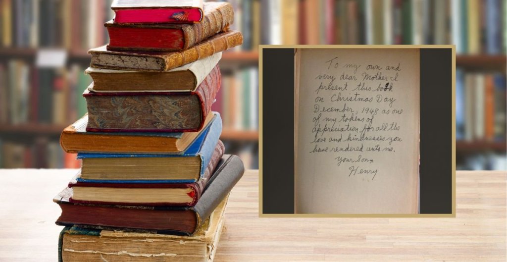 stack of old books and a book inscription