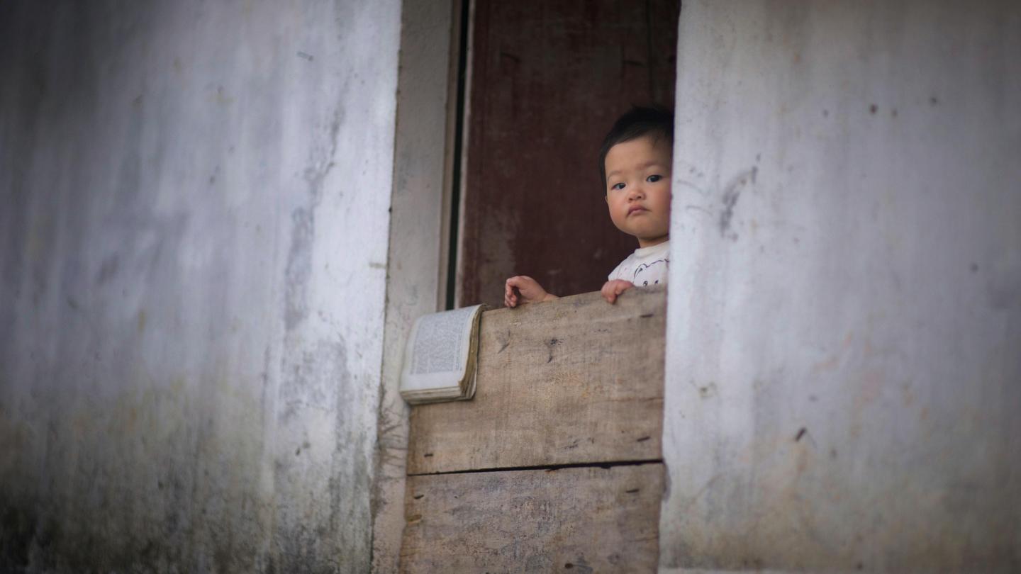 toddler falls; man catches toddler; CCTV