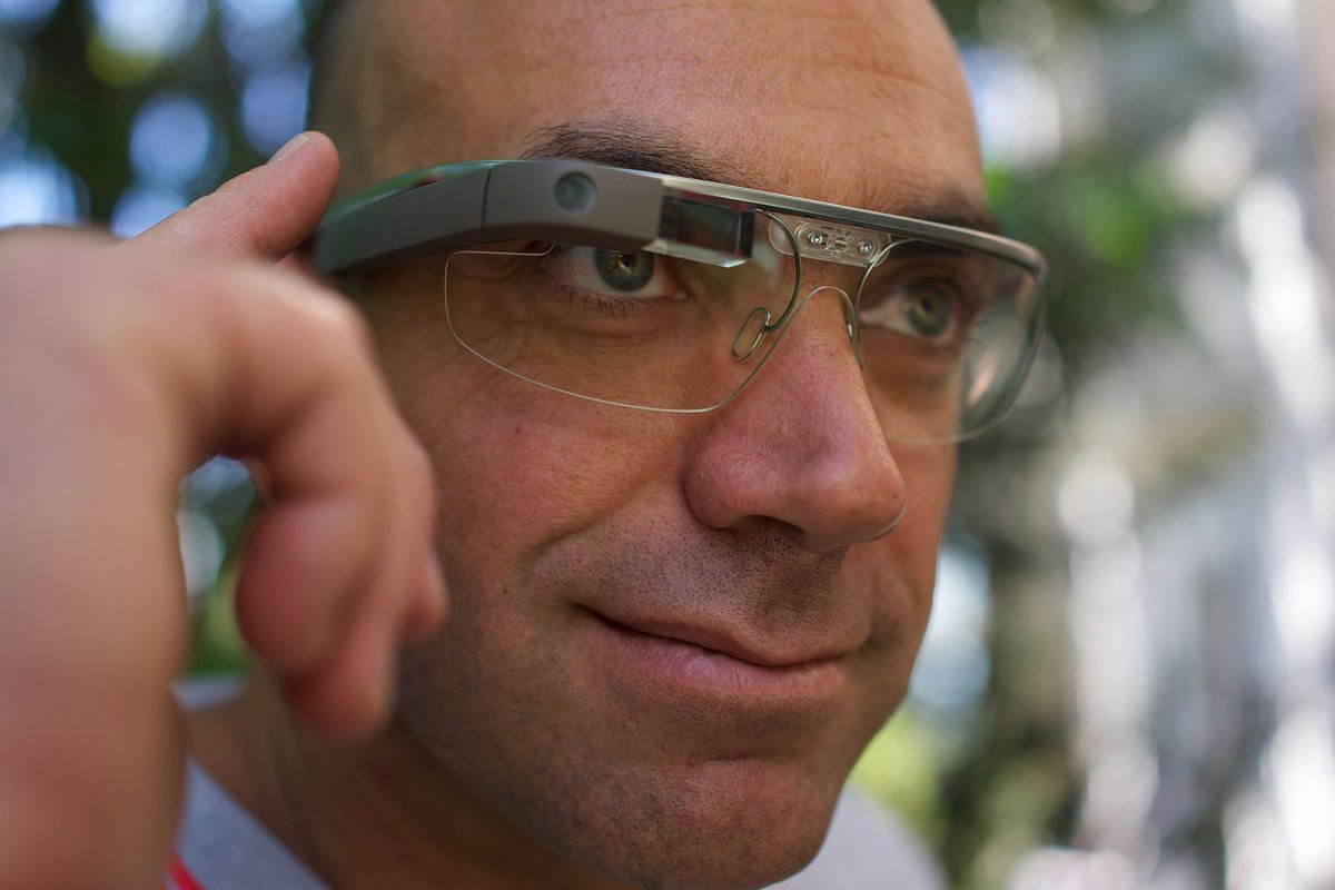 A man wearing Google Glass.