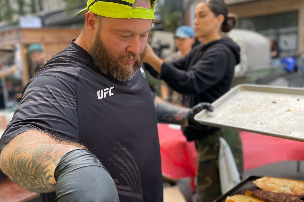 Action Bronson helps prepare meals