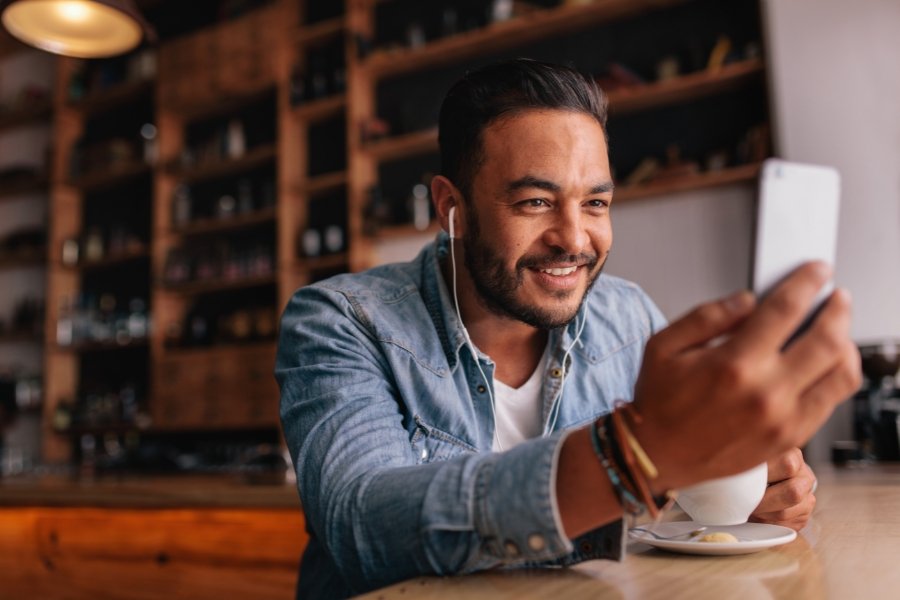 man taking video selfie