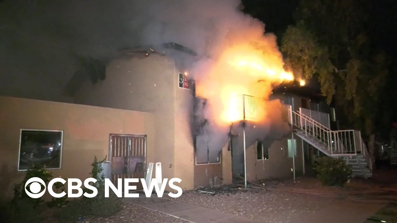 screenshot from CBS News of burning building