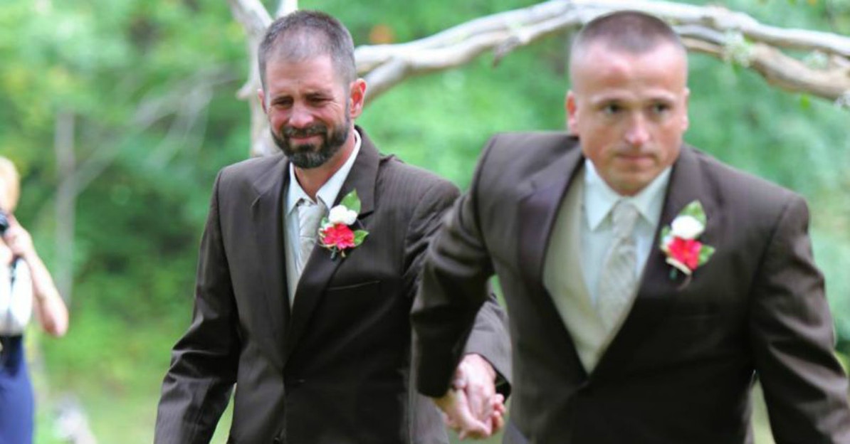 two men in tuxedos at a wedding