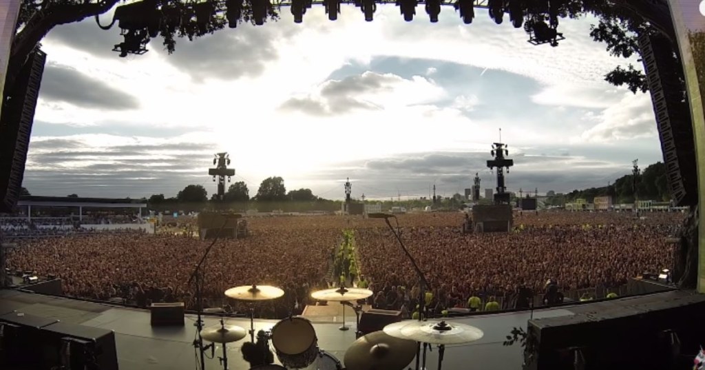 a full stadium seen from the stage.