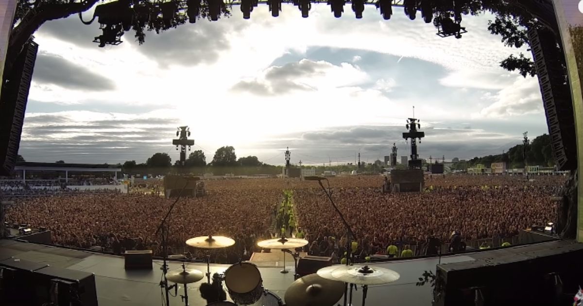 a full stadium seen from the stage.