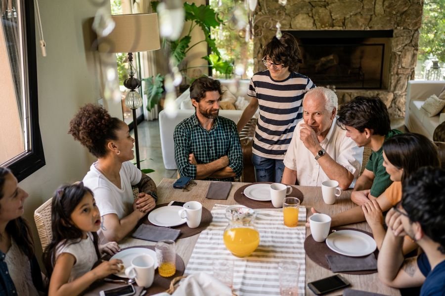 extended family sitting around a table