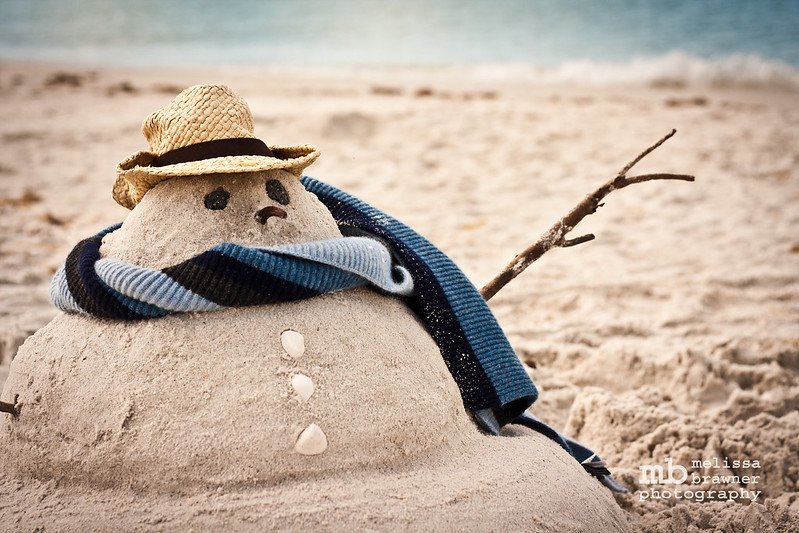 snowman in the sand at the beach