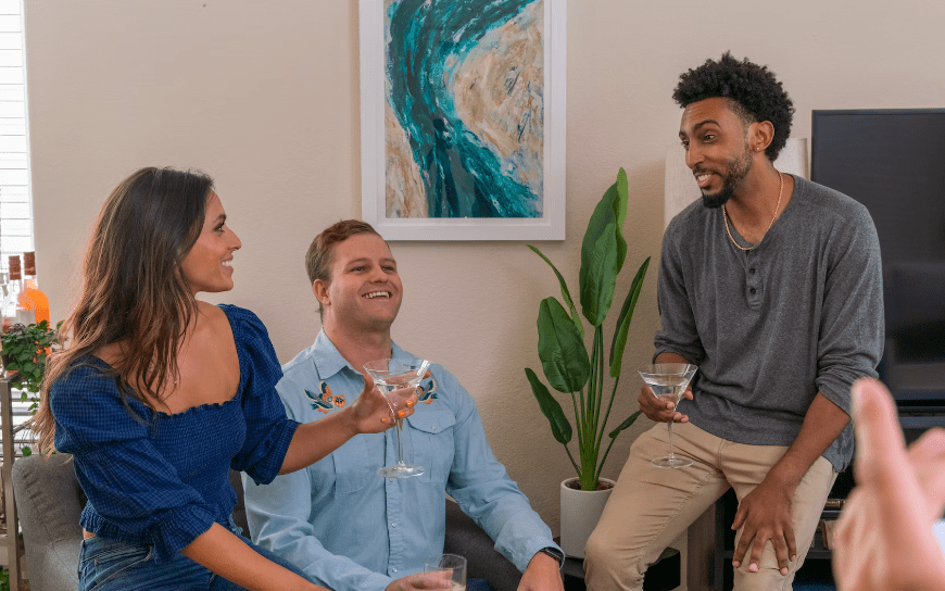 three people in conversation.