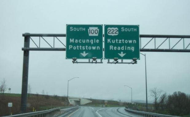 empty freeway with route signs above
