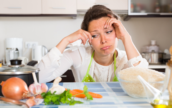 sad woman, woman cooking, kitchen