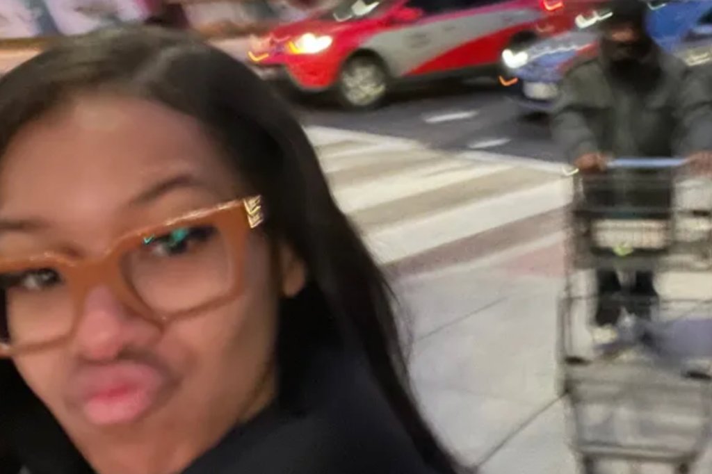 Sanai Graden selfie with man pushing a grocery cart
