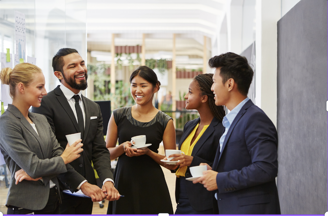 group of young professionals talking with tea