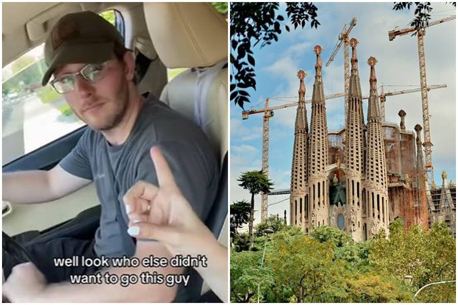 man in car; ornate building in Spain