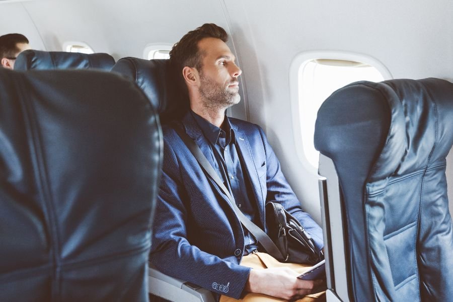 flight etiquette; switching seats on plane; refusing to switch seats; flying; travel; parenting