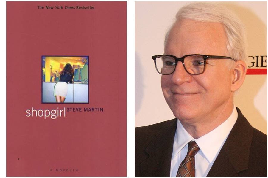 Steve Martin smiling beside the cover of his book, Shopgirl