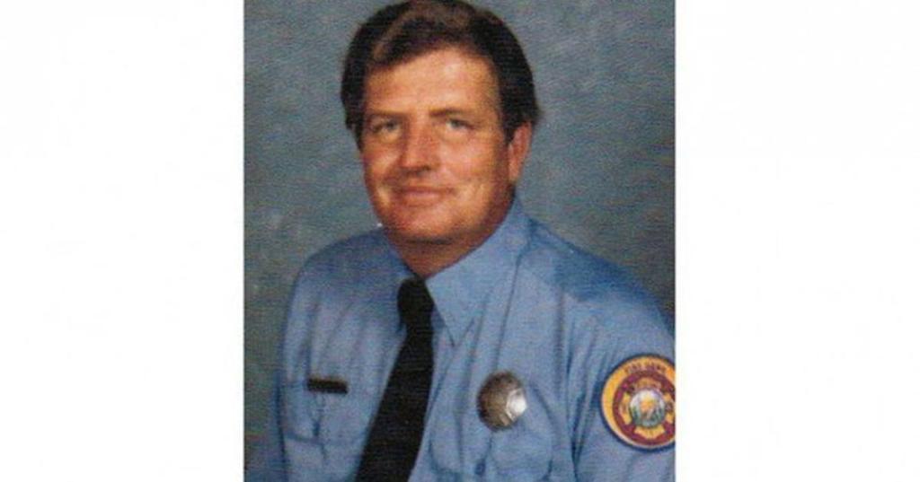 Fireman poses for photo