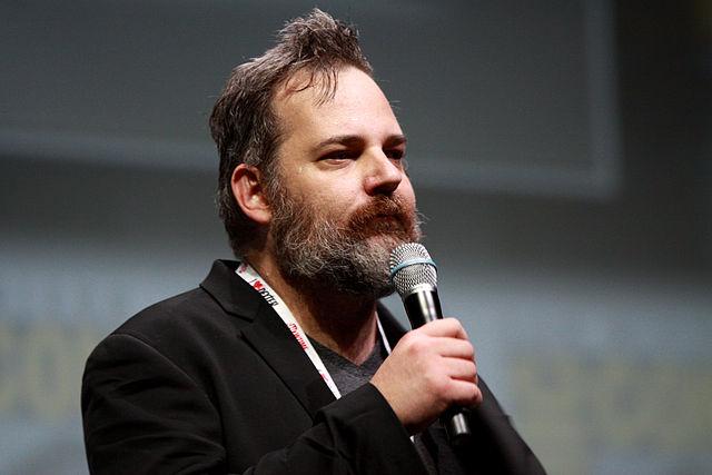 Dan Harmon speaking into a microphone