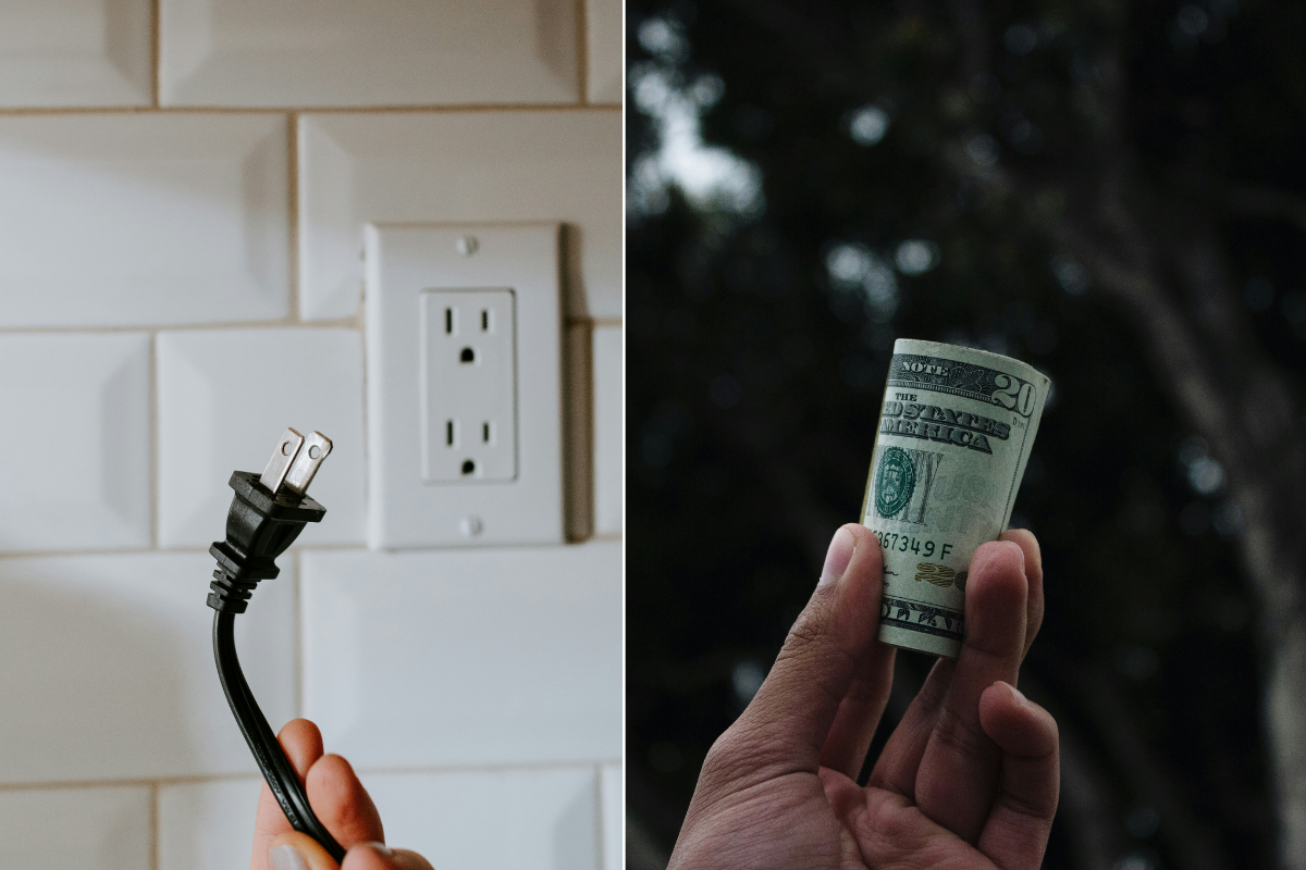 Hand holding an unplugged electric cord and hand holding rolled up money