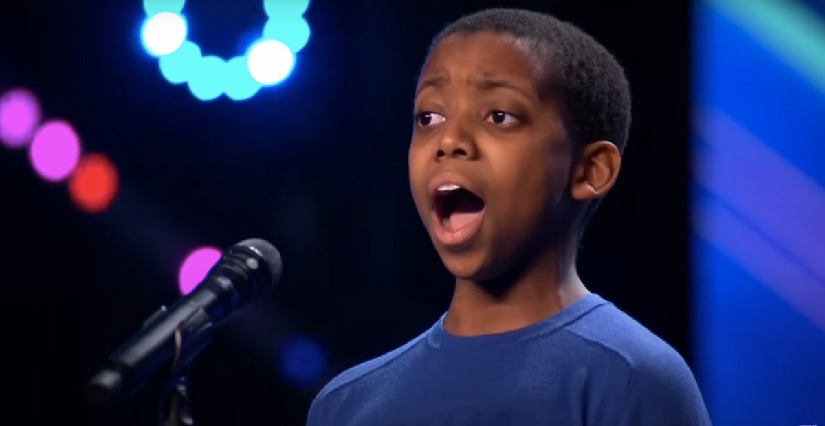 Malakai Boyah singing on stage