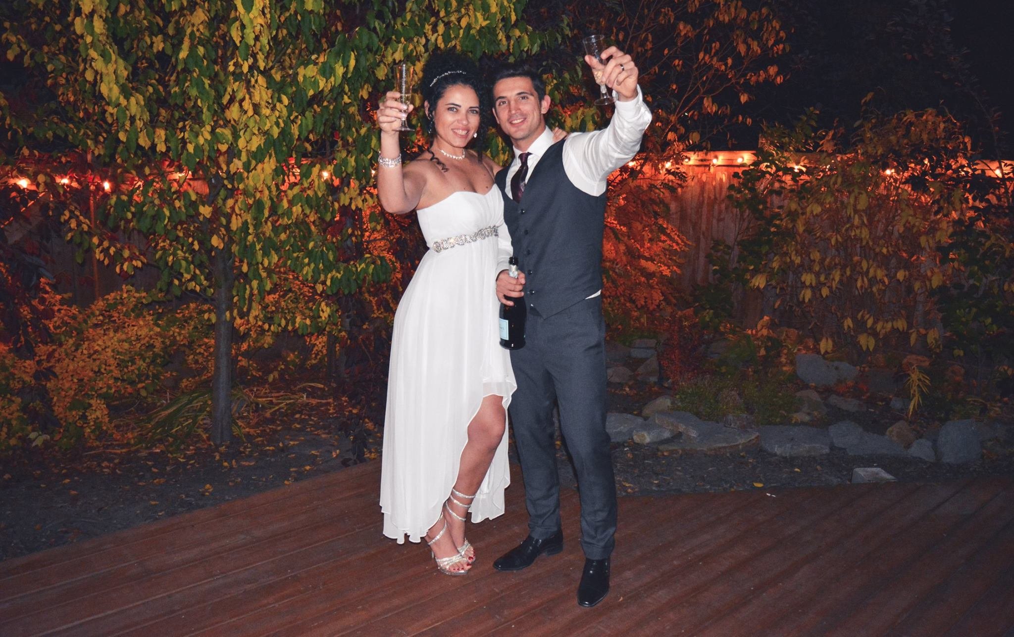 bride and groom toasting