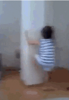 gif of a child climbing a pillar 