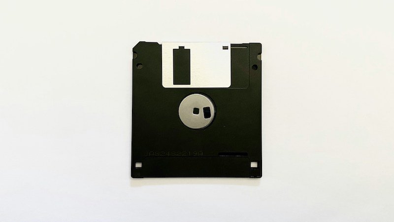 Vintage floppy disk against white background