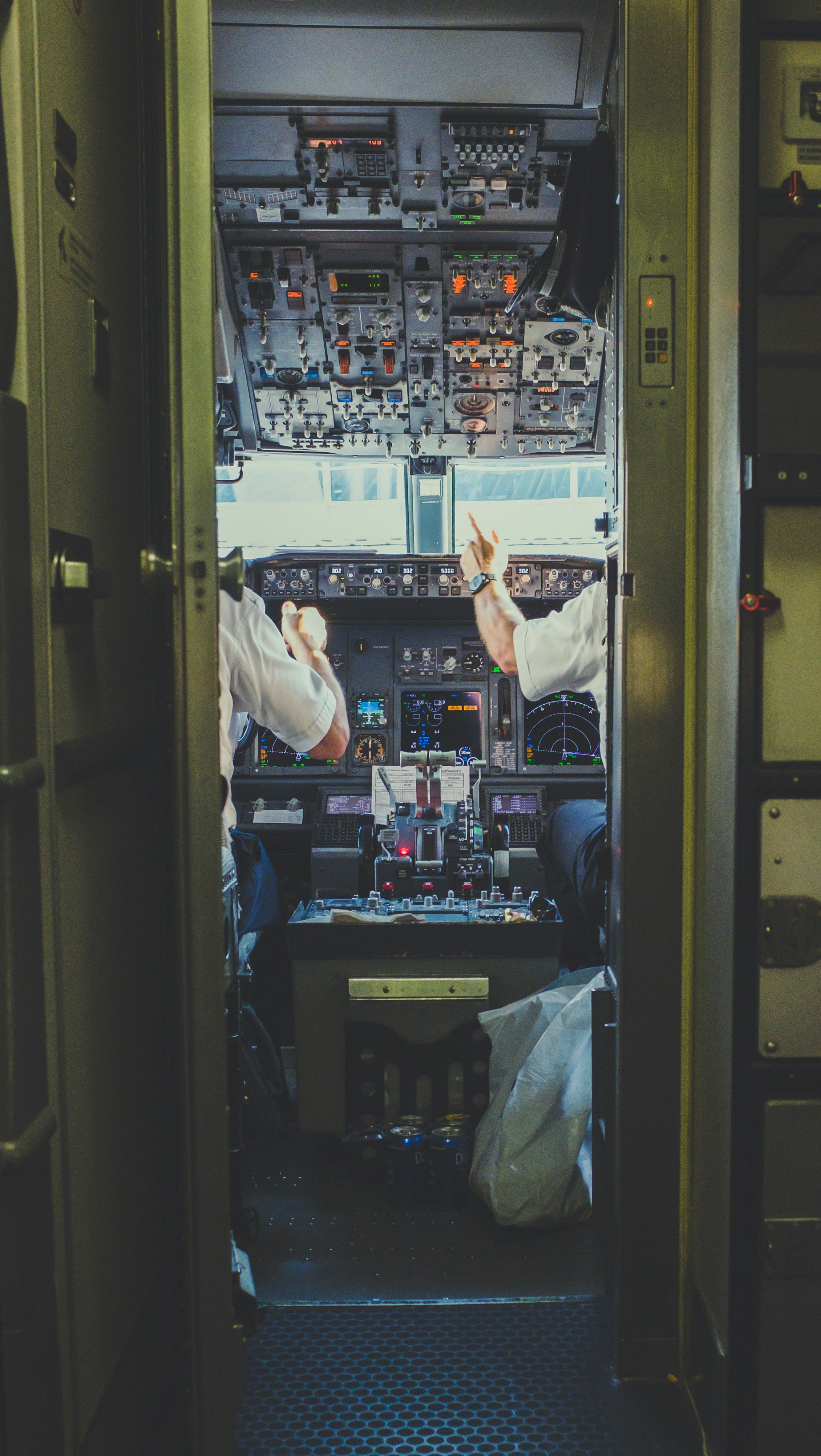 pilot and copilot inside airplane cockpit